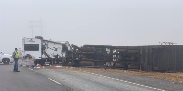 A tractor-trailer jackknifed and rolled over as it crashed into a pileup on Highway 84 in Lubbock County, Texas.