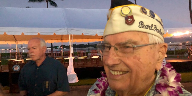 Herb Elfring, 97, of Jackson, Mich. attends the ceremonies at Pearl Harbor, Hawaii on Saturday, Dec. 7, 2019. Elfring survived the attack on Pearl Harbor as a soldier in the California National Guard’s 251st Coast Artillery. (AP Photo/Audrey McAvoy)