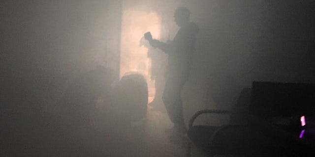 Training exercise at the Foreign Affairs Security Training Center in Blackstone, Virginia. This training is designed to help embassy workers overseas develop the practical skills necessary to operate during an emergency. During the drill, agents must find their way out of a smoke-filled mock embassy.