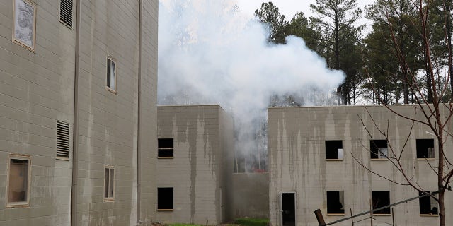 Smoke billowing out of a mock U.S. embassy at the Foreign Affairs Security Training Center in Blackstone, Virginia. The 1,350-acre compound was built to train federal agents how to respond to security threats and attacks around the world. (Fox News/Barnini Chakraborty)