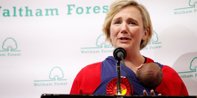 Labour candidate for Walthamstow Stella Creasy carries her baby daughter as she speaks after winning in Britain's general election in Waltham Forest Town Hall, Walthamstow, Britain.