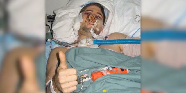 Redman at the Combat Support Hospital in Baghdad on Sept 13, 2007 -- after emergency surgery, following the firefight that almost took his life.
