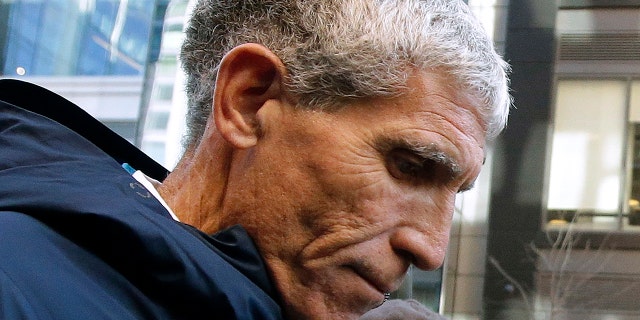 William "Rick" Singer, founder of the Edge College & Career Network, leaves federal court in Boston after pleading guilty on March 12, 2019. (AP Photo/Steven Senne, File)