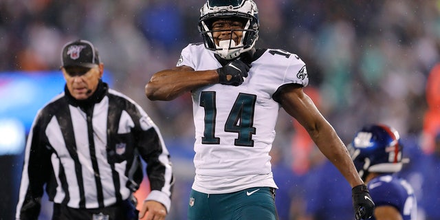 Philadelphia Eagles wide receiver Robert Davis (14) celebrates catching a pass in front of New York Giants cornerback Julian Love in the second half of an NFL football game, Sunday, Dec. 29, 2019, in East Rutherford, N.J. (AP Photo/Adam Hunger)