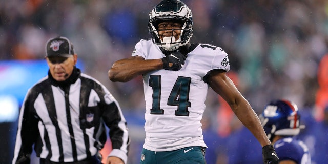 Philadelphia Eagles wide receiver Robert Davis (14) celebrates catching a pass in front of New York Giants cornerback Julian Love in the second half of an NFL football game, Sunday, Dec. 29, 2019, in East Rutherford, N.J. (AP Photo/Adam Hunger)