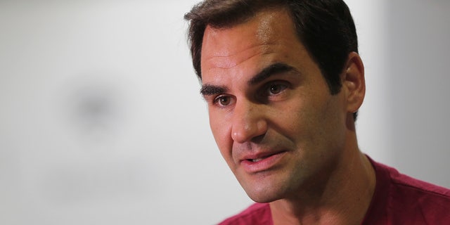 In this Sunday, Dec. 15, 2019 photo, Roger Federer talks to the Associated Press reporter during an exclusive interview in Dubai, United Arab Emirates. 
