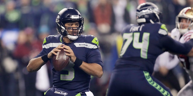 Seattle Seahawks quarterback Russell Wilson drops back to pass against the San Francisco 49ers during the first half of an NFL football game, Sunday, Dec. 29, 2019, in Seattle. (AP Photo/Stephen Brashear)