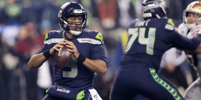 Seattle Seahawks quarterback Russell Wilson drops back to pass against the San Francisco 49ers during the first half of an NFL football game, Sunday, Dec. 29, 2019, in Seattle. (AP Photo/Stephen Brashear)
