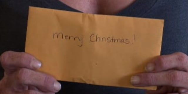 The envelope, which had "Merry Christmas!" written on it, contained 10 $100 bills, which the customer said could be used toward whatever Klein needed. (Photo: KABC)