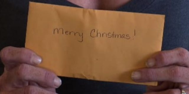 The envelope, which had "Merry Christmas!" written on it, contained 10 $100 bills, which the customer said could be used toward whatever Klein needed. (Photo: KABC)