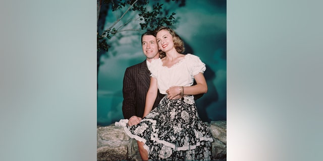 James Stewart (1908-1997) and Donna Reed (1921-1986) smiling in a publicity portrait issued for the film,