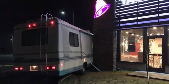 The RV seemingly got stuck as it attempted to make a tight turn in the drive-thru lane.