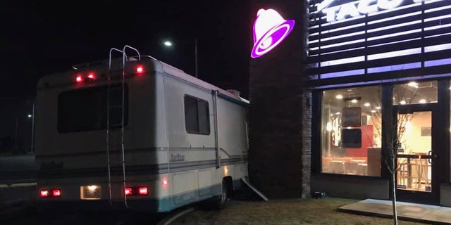 The RV seemingly got stuck as it attempted to make a tight turn in the drive-thru lane.