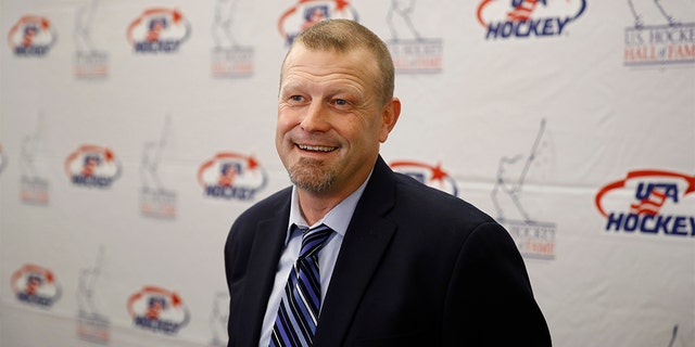 Former Boston Bruins goalie Tim Thomas speaks with members of the media before being inducted into the U.S. Hockey Hall of Fame, Thursday, Dec. 12, 2019, in Washington. (AP Photo/Patrick Semansky)