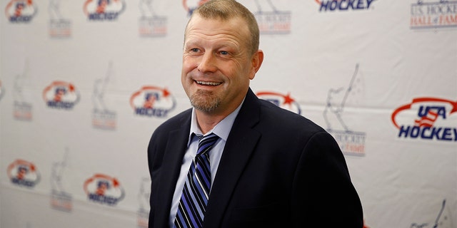 Former Boston Bruins goalie Tim Thomas speaks with members of the media before being inducted into the U.S. Hockey Hall of Fame, Thursday, Dec. 12, 2019, in Washington. (AP Photo/Patrick Semansky)