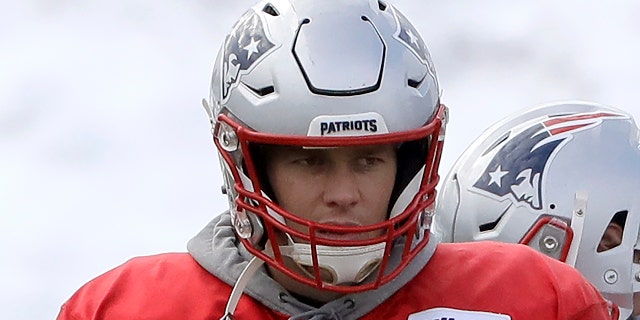 New England Patriots quarterback Tom Brady (12) warms up during an NFL football practice, Wednesday, Dec. 4, 2019, in Foxborough, Mass. (AP Photo/Steven Senne)