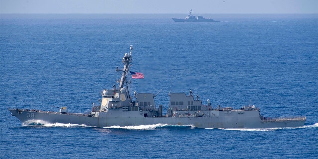 The Arleigh Burke-class guided-missile destroyers USS Forrest Sherman (DDG 98) and USS Farragut (DDG 99) transit the Atlantic Ocean - file photo.