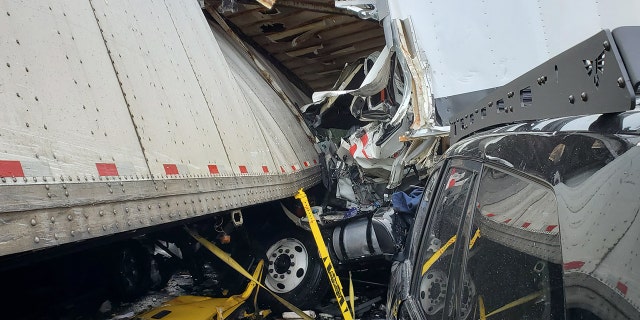 A 34-mile stretch of the interstate was still closed Thursday as crews worked to remove the mangled wrecks.