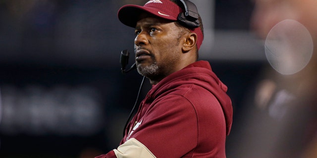 FILE - In this Saturday, Oct. 19, 2019, file photo, Florida State coach Willie Taggart watches his team play Wake Forest during the first half of an NCAA college football game in Winston-Salem, N.C. Florida Atlantic has reached an agreement with Taggart to be its new football coach, replacing Lane Kiffin, said a person familiar with the negotiations. (AP Photo/Nell Redmond, File)