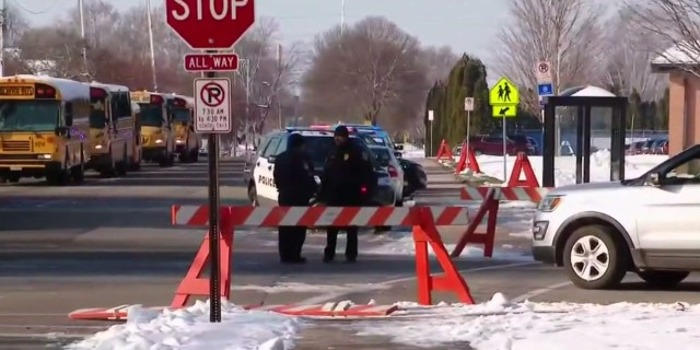 An armed student at Oshkosh West High School in Wisconsin confronted a school resource officer on Tuesday, according to police.