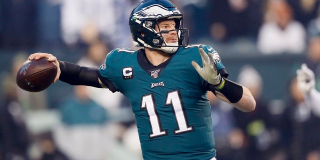 Philadelphia Eagles quarterback Carson Wentz throws a pass during the first half of an NFL football game against the Dallas Cowboys Sunday, Dec. 22, 2019, in Philadelphia. (AP Photo/Michael Perez)
