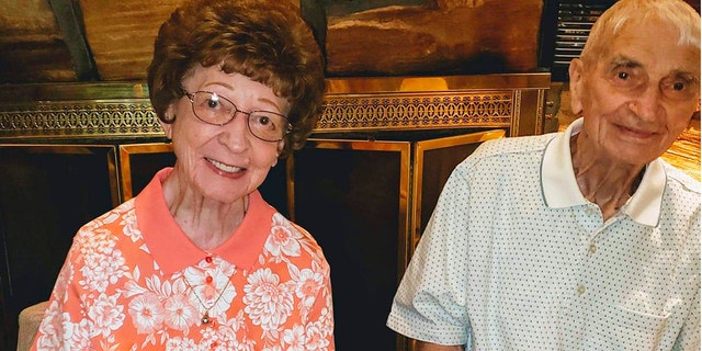 This June 2019 photo provided by Leah Smith shows Les and Freda Austin of Jackson, of Michigan, pose for a photo at a birthday party. The Michigan couple, who family members say did everything together for 70 years up to their final breaths, died 20 minutes apart in the same hospice care on Dec. 6, MLive.com reports. (Leah Smith via AP)