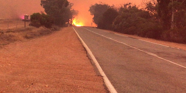 A fast-moving fire on Sunday approached the town of Mogumber, located about 80 miles northwest of Perth. 