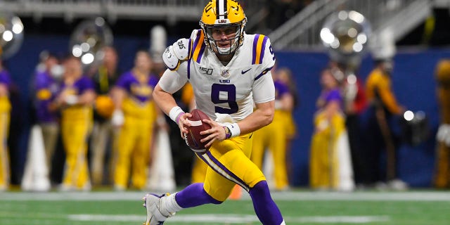 LSU quarterback Joe Burrow (9) runs down field against Georgia during the first half of the Southeastern Conference championship NCAA college football game, Saturday, Dec. 7, 2019, in Atlanta. (Associated Press)