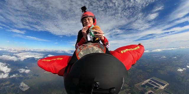 McKenna Knipe, 24, was filmed testing the Burger King Impossible Whopper using a GoPro while she was skydiving.