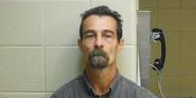 Frankie Carmody, 47, faces charges of first-degree false imprisonment, possession of a controlled substance, possession of firearms by certain persons and furnishing, possessing or using prohibited articles, authorities say. (Clark County Sheriff)