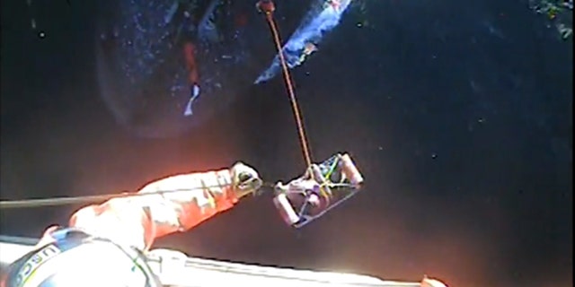 A dramatic video shows the U.S. Coast Guard rescuing a fisherman who was seriously injured off the coast of Washington over the weekend.