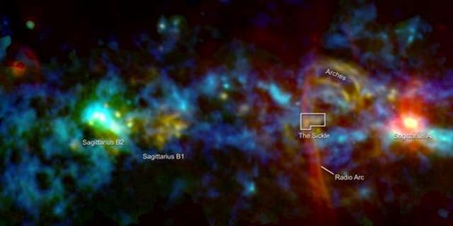 This image of the inner galaxy color codes different types of emission sources by merging microwave data (green) mapped by the Goddard-IRAM Superconducting 2-Millimeter Observer (GISMO) instrument with infrared (850 micrometers, blue) and radio observations (19.5 centimeters, red). (NASA's Goddard Space Flight Center)