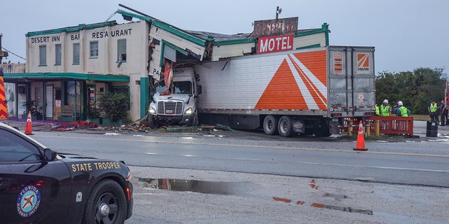 A tractor trailer slammed into the historic Desert Inn and Restaurant in Yeehaw Junction, Fla., early Sunday, according to a report.