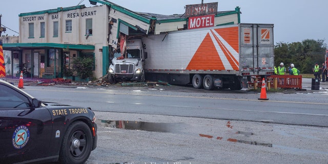A tractor trailer slammed into the historic Desert Inn and Restaurant in Yeehaw Junction, Fla., early Sunday, according to a report.