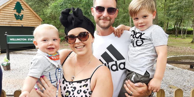 Amy Palmer pictured with her husband Colin and two young children Lenny, now one, and Frankie, 4, first discovered the lump while breastfeeding her son.