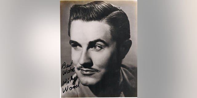 A photo of Ed Wood signed by Kathy Wood.