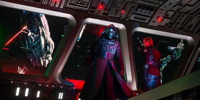 Guests come face to face with First Order Supreme Leader Kylo Ren as they stumble into the bridge of a Star Destroyer in Star Wars: Rise of the Resistance.