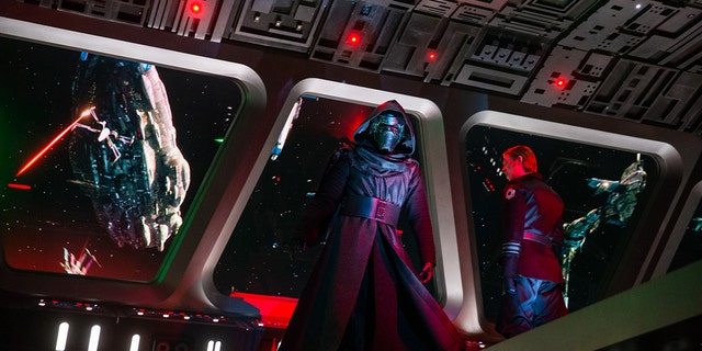 Guests come face to face with First Order Supreme Leader Kylo Ren as they stumble into the bridge of a Star Destroyer in Star Wars: Rise of the Resistance.