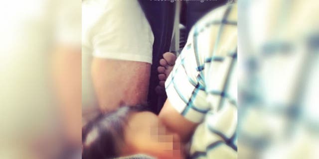The viral photo shows an unnamed passenger rudely sticking their bare foot somewhere it doesn't belong. (Passengershaming Instagram)