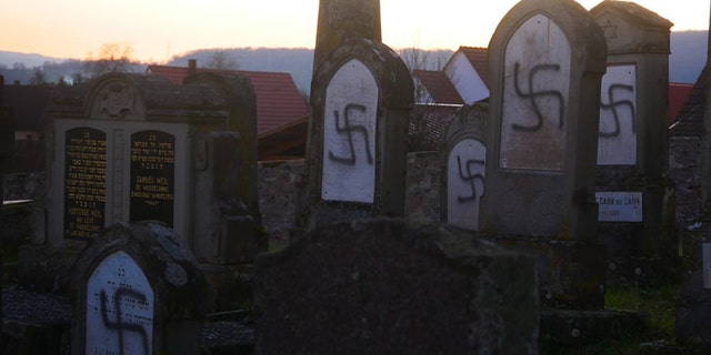 Pictures of some of the tombstones that were vandalized at the Westhoffen cemetery.