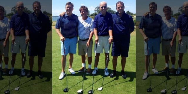 Devon Archer, far left, with former Vice President Joe Biden and his son Hunter, far right, in 2014.