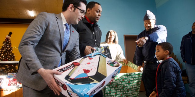 Around 80 to 100 children started handing over their imitation firearms and water pistols to members of law enforcement for educational toys.