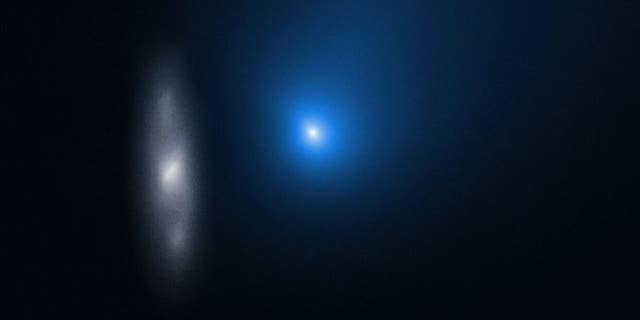 Comet 2I/Borisov and Distant Galaxy in November 2019