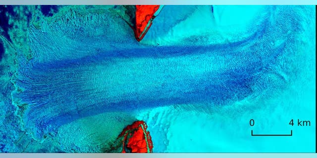 The Vavilov ice cap in the Arctic Circle is now experiencing rapid ice loss by way of an ice stream, shown here. It has shed 9.5 billion tons of ice since 2013. (University of Cornell)