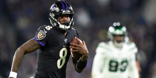Ravens Top Jets 42 21 Clinch Afc North Title On Huge Night