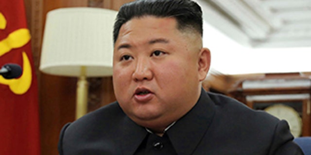 In this photo provided Sunday, Dec. 22, 2019, by the North Korean government, North Korean leader Kim Jong Un speaks during a ruling party meeting, North Korea. (Korean Central News Agency/Korea News Service via AP)
