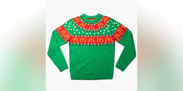 The $65 knit sweater comes in a very festive red-and-green color scheme, and is available in the new McDonald's online shop.