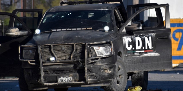 A damaged pick up marked with the initials C.D.N., that in Spanish stand for Cartel of the Northeast