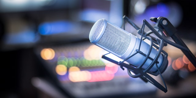 Professional studio microphone, recording studio, equipment at blurred background