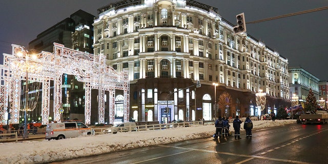 Artificial snow can be seen on Tverskaya Street in Moscow after it was placed over the weekend.